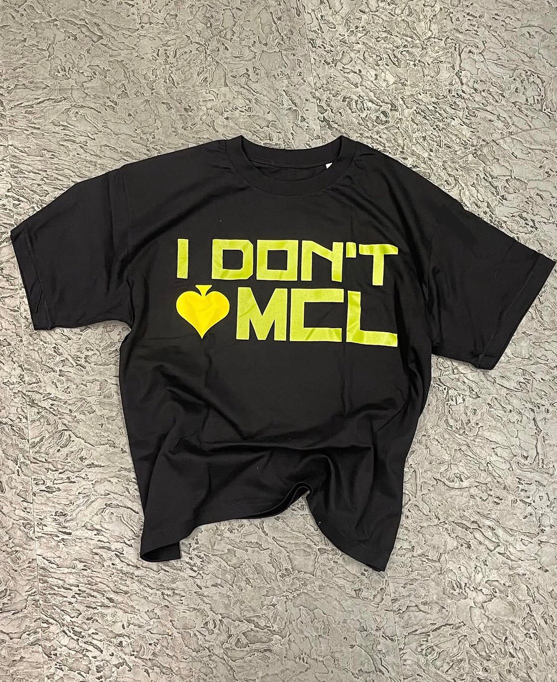 " i don’t <3 mcl" Green tee